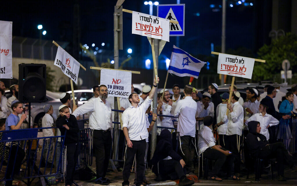 Anti-Christian protesters gather outside an International Christian Embassy of Jerusalem event in the capital on October 3, 2023. (Chaim Goldberg/FLASH90)