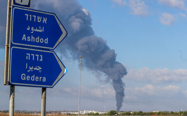 Smoke rises after a rocket fired from the Gaza Strip hits southern Israel, October 7, 2023 (Jamal Awad/Flash90)