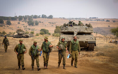 IDF soldiers at a staging area near the border with Lebanon, northern Israel, October 9, 2023. (David Cohen/Flash90)