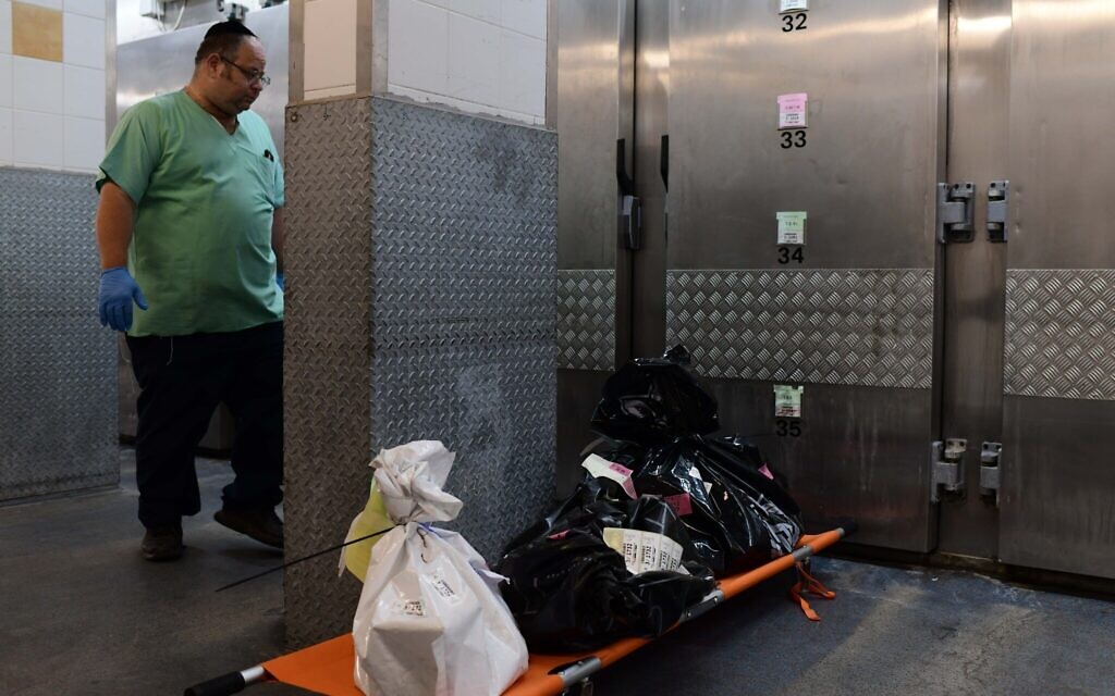 Human remains of victims of the mass murderous attack by Hamas on southern Israeli communities on October 7, 2023 await advanced examination at the National Center of Forensic Medicine (Abu Kabir) in Jaffa, October 16, 2023. (Tomer Neuberg/Flash90)