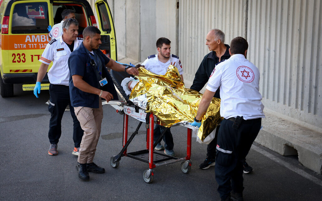 An Israeli injured when a missile was fired from Lebanon toward Metula arrives at the Ziv Medical Center in Safed, October 17, 2023 (David Cohen/Flash90)