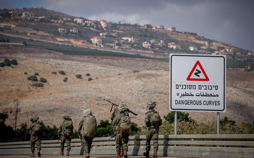 Israeli soldiers patrol near the border with Lebanon, northern Israel, October 19, 2023. (David Cohen/Flash90)