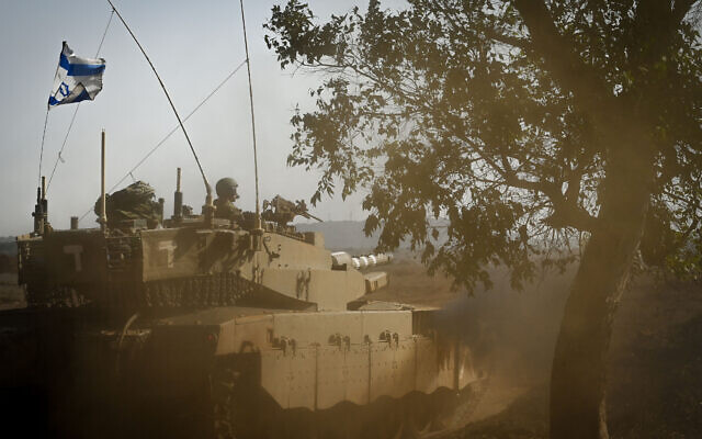 An Israeli tank takes part in a military exercise in the Golan Heights on October 23, 2023. (Michael Giladi/Flash90)