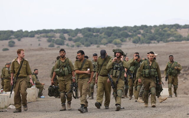Israeli reserve soldiers seen during military training in the Golan Heights, northern Israel, October 30, 2023. (David Cohen/Flash90)