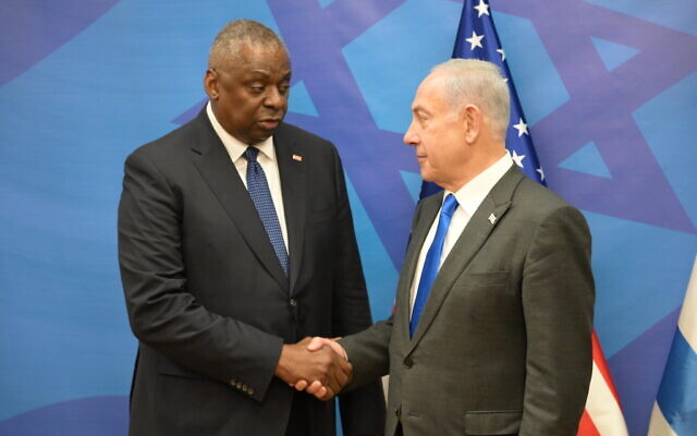 Prime Minister Benjamin Netanyahu (right) and US Defense Secretary Lloyd Austin meet in Tel Aviv on October 13, 2023. (Amos Ben Gershom/GPO)