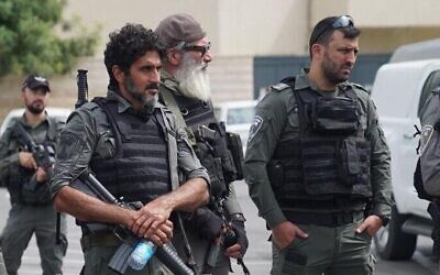 Israeli 'Fauda' series actor Tsahi Halevi, second from left, during a weapons raid in the city of Lod, October 2, 2023. (Israel Police)