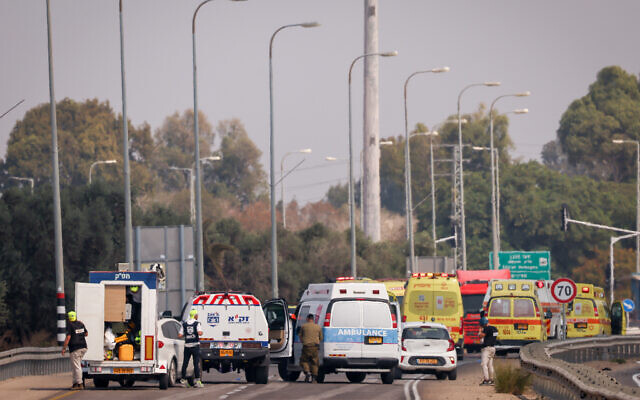 Ambulance and rescue personnel outside of the southern Israeli town of Sderot, October 8, 2023. (Chaim Goldberg/Flash90)