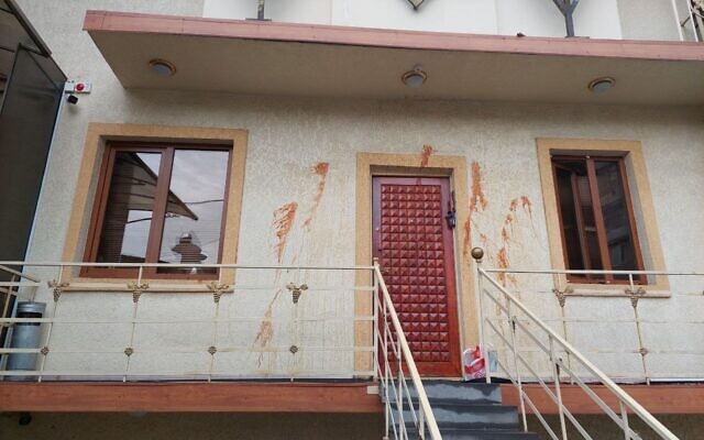 Red paint is seen smeared on the facade of the Mordechay Navi Jewish Religious Center in Yerevan, Armenia, following a suspected antisemitic incident on October 3, 2023. (CER)