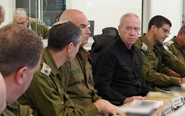 Defense Minister Yoav Gallant meets with IDF commanders at the Northern Command base in Safed, October 14, 2023. (Ariel Hermoni/Defense Ministry)