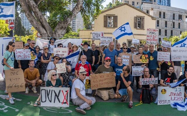 Israelis protest outside the Defense Ministry in Tel Aviv on October 14, 2023, calling on Prime Minister Benjamin Netanyahu to resign over the devastating Hamas attack that killed 1,300 people (courtesy Niki Sharir)