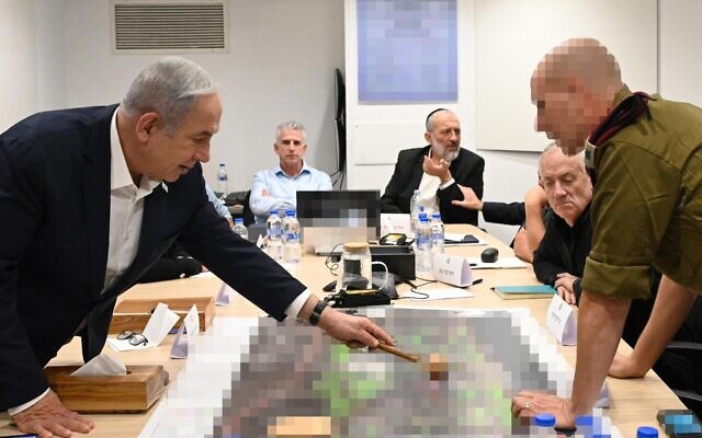 Prime Minister Benjamin Netanyahu meets with the war cabinet at the IDF's Kirya military headquarters in Tel Aviv on October 18, 2023. (Haim Zach/GPO)