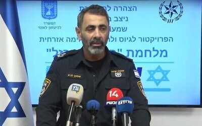 Shimon Lav, the National Security Ministry coordinator for establishing and arming civilian security squads and a retired deputy police commissioner, speaks at a press conference in the ministry, October 24, 2023. (Courtesy the National Security Ministry)