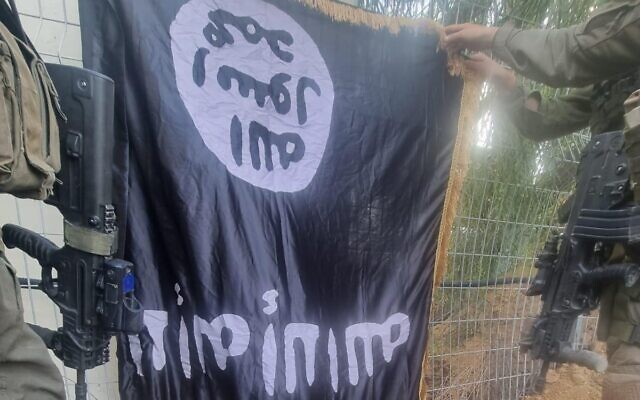 An undated pic on Islamic State flag found on terrorist killed during attack on Kibbutz Sufa (Israel Defense Forces)