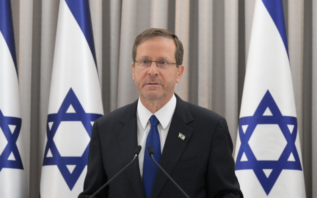 President Isaac Herzog speaks to the nation, October 8, 2023. (Amos Ben Gershom/GPO)