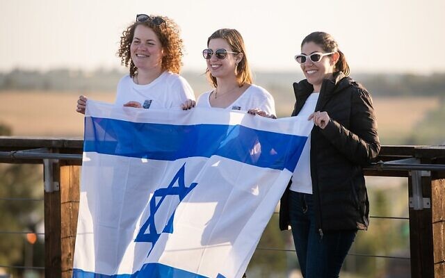 Masa Israel fellows commemorate Yom Hazikaron, Memorial Day, in a ceremony at Latrun on April 25, 2023. (Courtesy of Masa Israel Journey)