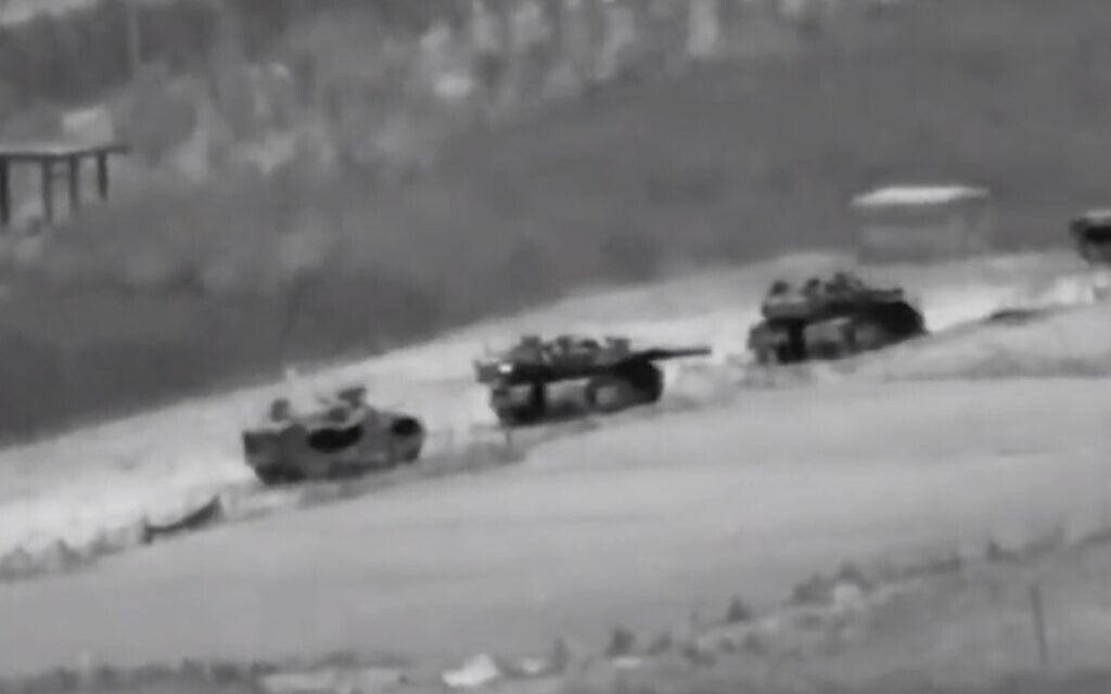 A still from video released by the IDF shows Israeli tanks rolling into Gaza on October 27, 2023. (Screen capture: IDF)