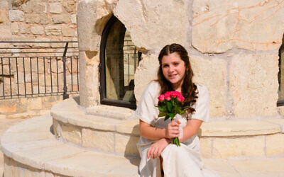 Rotem Sapir from Kfar Maimon celebrated her bat mitzvah at the Tower of David Museum, with a free photo shoot offered for evacuees from the October 7, 2023, Hamas attacks; her mother, Liat Sapir, commented, 'When we put our story in the perspective of 2,000-plus years, how much hope it gives' (Courtesy Tower of David Museum/Sharon Marks Atshul)