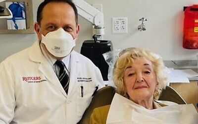 At Rutgers Dental School, Holocaust survivor Yelena Olshansky receives free treatment from professor of restorative dentistry Peter L. DeSciscio (Courtesy)