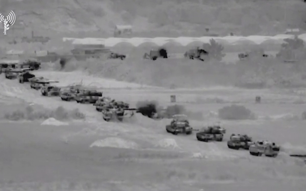 A still from video released by the IDF shows Israeli tanks rolling into Gaza on October 28, 2023. (Screen capture: IDF)