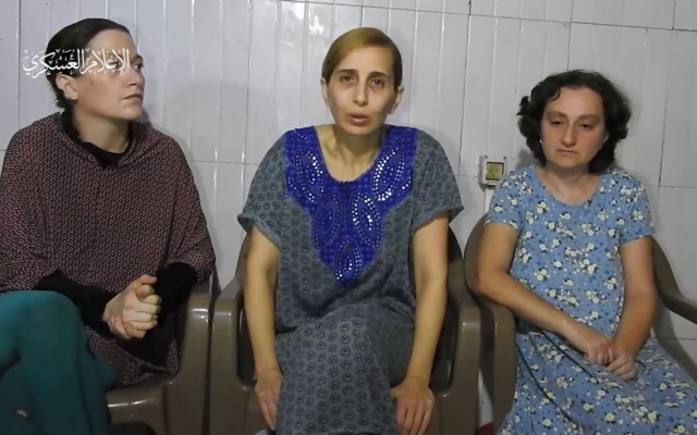 A screenshot from a propaganda video released by Hamas on October 30, 2023, showing three Israeli hostages: Rimon Buchshtab Kirsht (left), Danielle Aloni (center), and Lena Trupanov (right)