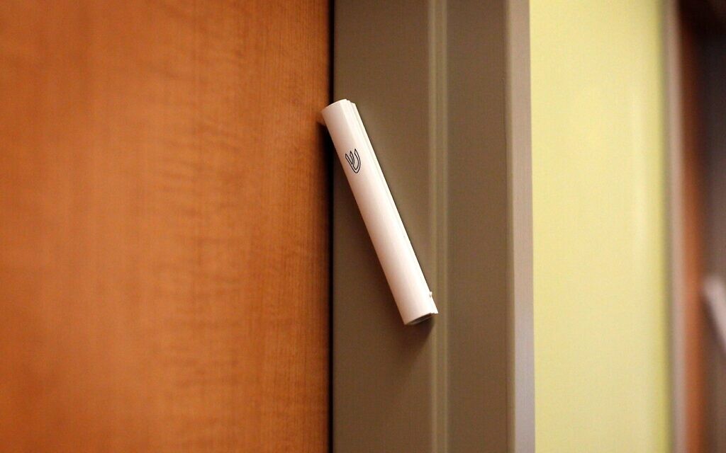 The mezuzah contains a passage from the Torah commanding Jews to inscribe the words on the doorposts of their homes. (Marta Iwanek/Toronto Star via Getty Images via JTA)