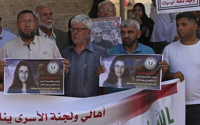 Members of the Palestinian Prisoners Committee hold a rally outside the International Committee of the Red Cross office in Gaza City on July 17, 2023, demanding the Iraqi government include Palestinian prisoners in Israeli jails in the exchange for Israeli-Russian academic Elizabeth Tsurkov. (Mohammed Abed/AFP)