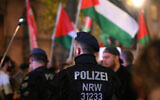 Illustrative: Riot police monitor as pro Palestinian demonstrators 'in solidarity with Gaza' hold a rally in Duisburg, western Germany, on October 9, 202 (Ina FASSBENDER / AFP)