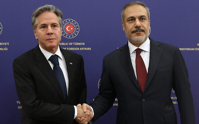 US Secretary of State Antony Blinken (L) is welcomed by Turkish Foreign Minister Hakan Fidan prior to their meeting at the foreign ministry in Ankara, on November 6, 2023. (Adem Altan/AFP)