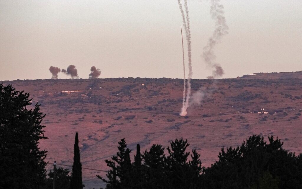 Rockets fired from southern Lebanon are intercepted above a position across the border near Kibbutz Dan in northern Israel on November 7, 2023. (Jalaa Marey/AFP)