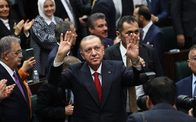 Turkish President and the leader of the Justice and Development (AK) Party Recep Tayyip Erdogan (C) gestures during his party's group meeting at the Turkish Grand National Assembly in Ankara, on November 15, 2023. (Adem ALTAN / AFP)