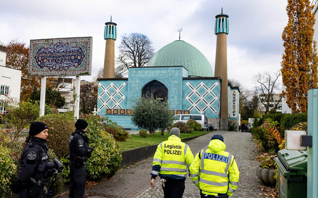 Police officers search the 'Blue Mosque' housing the Islamic Centre of Hamburg, during raids across Germany over suspected links to the Iran-backed Hezbollah terror group in Hamburg, northern Germany on November 16, 2023 (Axel Heimken / AFP)