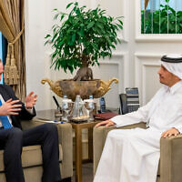 A handout picture released by the official Qatari news agency (QNA) shows Qatari Foreign Minister Mohammed bin Abdulrahman bin Jassim al-Thani (R) meeting with US National Security Council Coordinator for the Middle East and North Africa Brett McGurk in Doha on November 19, 2023. (Qatar News Agency / AFP)