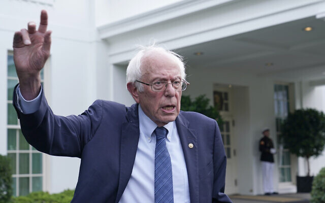 Senator Bernie Sanders of Vermont talks with reporters following his meeting with US President Joe Biden at the White House in Washington, August 30, 2023. (AP Photo/Susan Walsh)