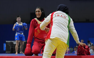Iranian athletes compete at 19th Asian Games in Hangzhou, China, Thursday, September 28, 2023. (AP Photo/Aijaz Rahi)