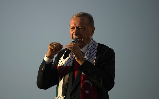 Turkish President Recep Tayyip Erdogan, speaks to the attendees during a rally to show their solidarity with the Palestinians, in Istanbul, Oct. 28, 2023. (AP Photo/Emrah Gurel)