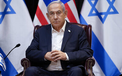 Prime Minister Benjamin Netanyahu listens as he and President Joe Biden participate in an expanded bilateral meeting with Israeli and US government officials on October 18, 2023, in Tel Aviv. (AP Photo/Evan Vucci, File)