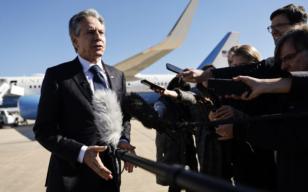 US Secretary of State Antony Blinken talks to reporters prior boarding his aircraft to depart Washington on travel to the Middle East and Asia at Andrews Air Force Base. Md., Thursday, Nov. 2, 2023. (Jonathan Ernst/Pool via AP)