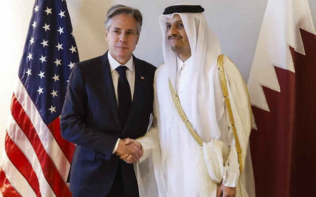 US Secretary of State Antony Blinken, left, meets with Qatari Prime Minister and Minister of Foreign Affairs Sheikh Mohammed bin Abdulrahman bin Jassim Al-Thani at a hotel during a day of meetings, amid the ongoing war between Israel and Hamas, in Amman, Jordan, November 4, 2023.(Jonathan Ernst/Pool Photo via AP)