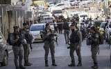 Border Police inspect the scene of a stabbing attack in East Jerusalem, Monday, Nov. 6, 2023. (AP Photo/Mahmoud Illean)