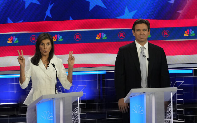 Republican presidential candidate former UN Ambassador Nikki Haley speaks as Florida Gov. Ron DeSantis listens during a Republican presidential primary debate hosted by NBC News, at the Adrienne Arsht Center for the Performing Arts of Miami-Dade County in Miami, November 8, 2023. (Rebecca Blackwell/AP)