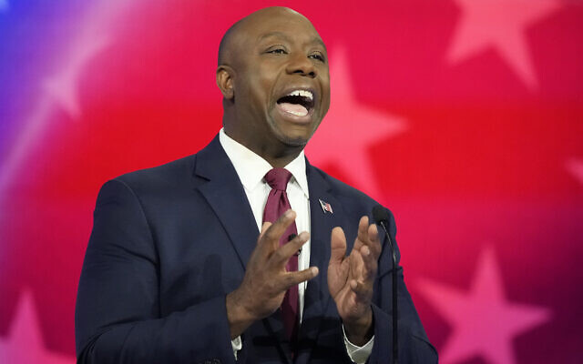 Republican Senator Tim Scott of South Carolina speaks during a Republican presidential primary debate hosted by NBC News, November 8, 2023, at the Adrienne Arsht Center for the Performing Arts of Miami-Dade County in Miami. (AP Photo/Rebecca Blackwell)