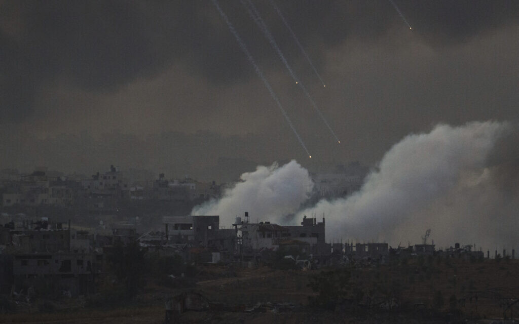 Smoke rises following an Israeli shelling in the Gaza Strip, as seen from southern Israel, Wednesday, Nov. 22, 2023. (AP Photo/Leo Correa)