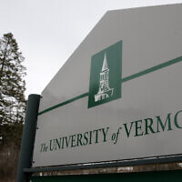 A sign on the University of Vermont campus in Burlington, Vermont, is pictured on March 11, 2020. (AP Photo/Charles Krupa, File)