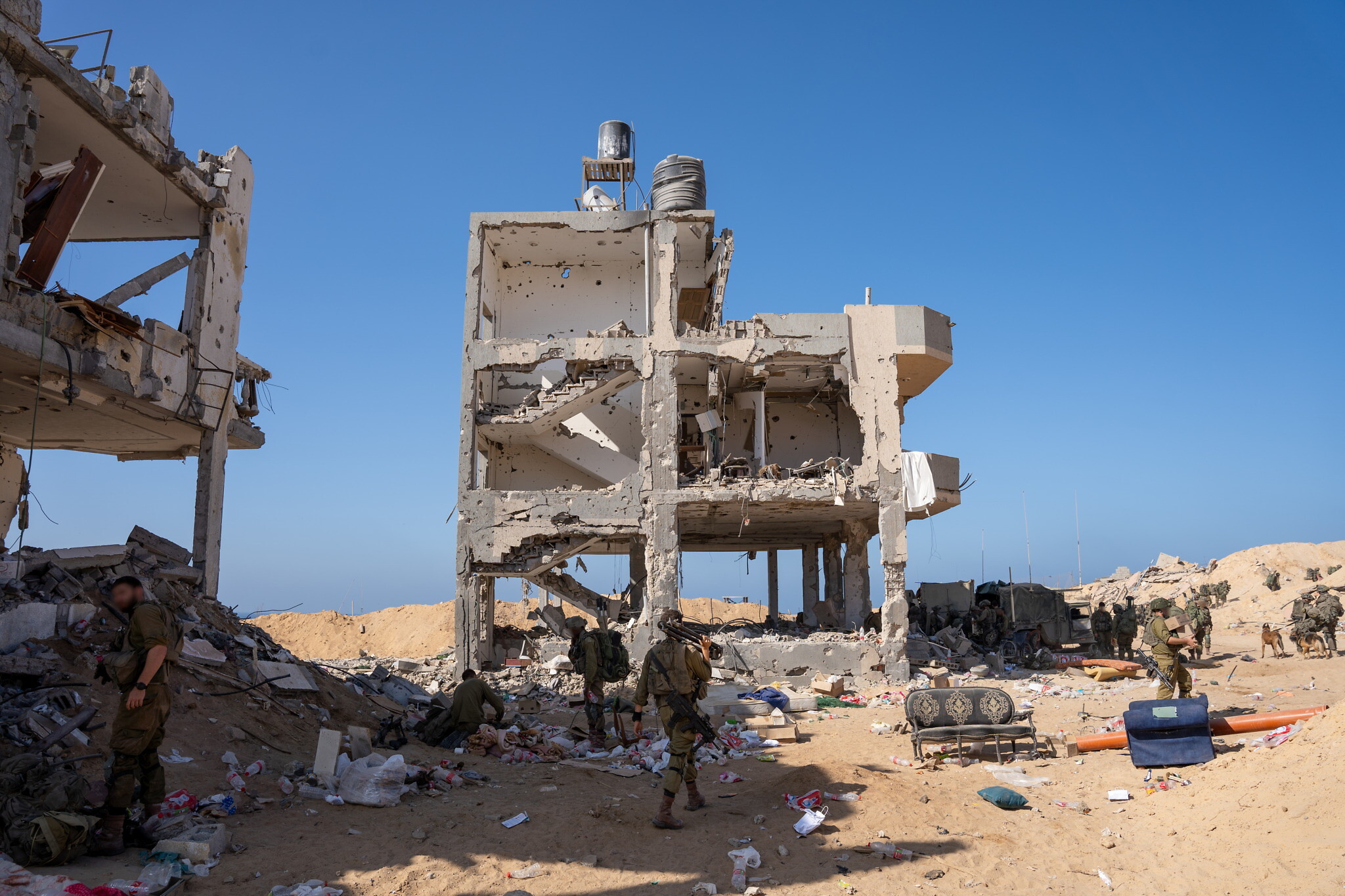 Damaged buildings are seen in the northern Gaza Strip,  November 7, 2023. (Emanuel Fabian/Times of Israel)