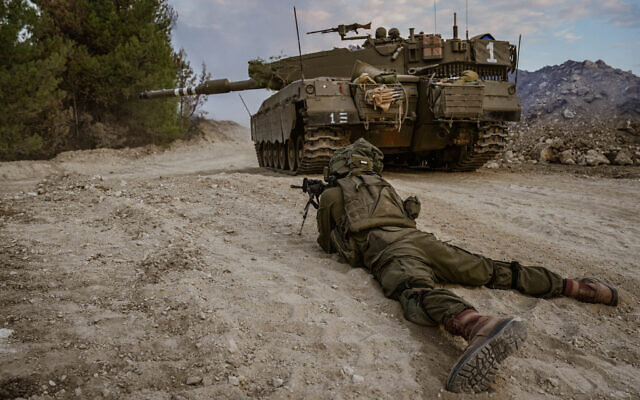Israeli soldiers patrol near the Israeli border with Lebanon, November 1, 2023. (Ayal Margolin/Flash90)