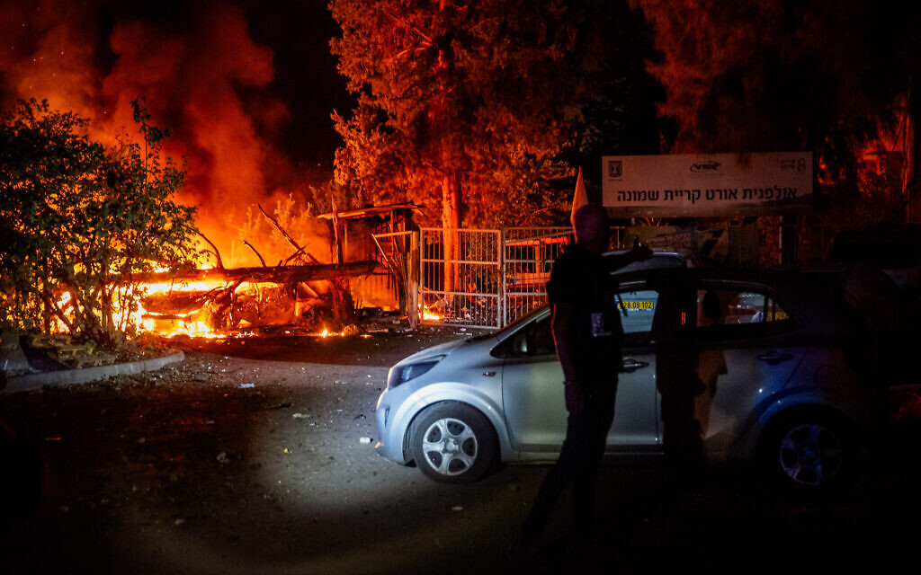 Fire sparked by a rocket strike from Lebanon in the northern town of Kiryat Shmona, November 5, 2023. (Erez Ben Simon/Flash90)