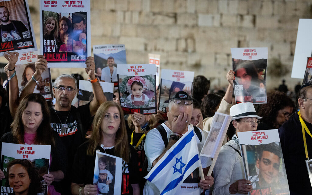Family and friends attend a ceremony for Israelis abducted by Hamas terrorists in Gaza a month after the October 7 massacre, at the Western Wall in Jerusalem's Old City, November 7, 2023. (Chaim Goldberg/Flash90)