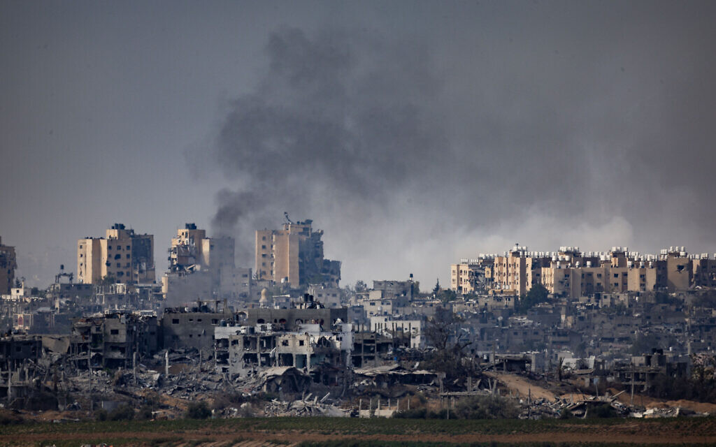Smoke rises during Israeli airstrikes, in the Gaza Strip, as seen from the Israeli side of the border, on November 13, 2023. (Yonatan Sindel/Flash90)