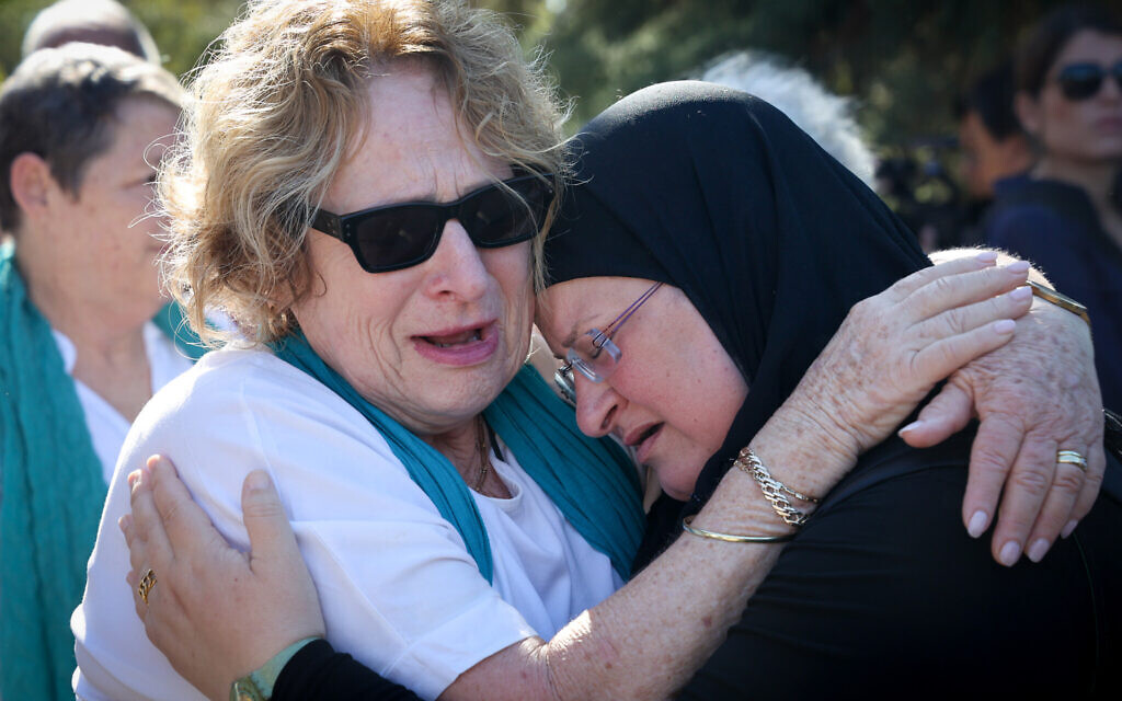 Family and friends attend a memorial service for peace activist and Women Wage Peace founder Vivian Silver at Kibbutz Gezer, November 16, 2023. (Jonathan Shaul/Flash90)