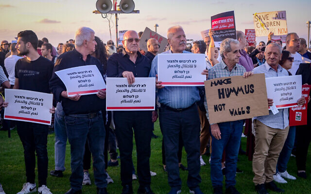 People demonstrate against the Israel-Hamas war in Tel Aviv, November 18, 2023. (Avshalom Sassoni/Flash90)